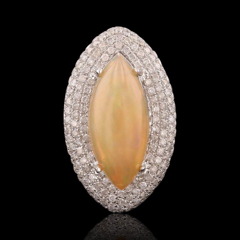 Photo 1 of ORIANNE 4.81ct OPAL AND 1.59ctw DIAMOND14K WHITE GOLD RING, TOTAL WEIGHT OF RING 7.97 g SIZE 7 WITH APPRAISAL RN019055