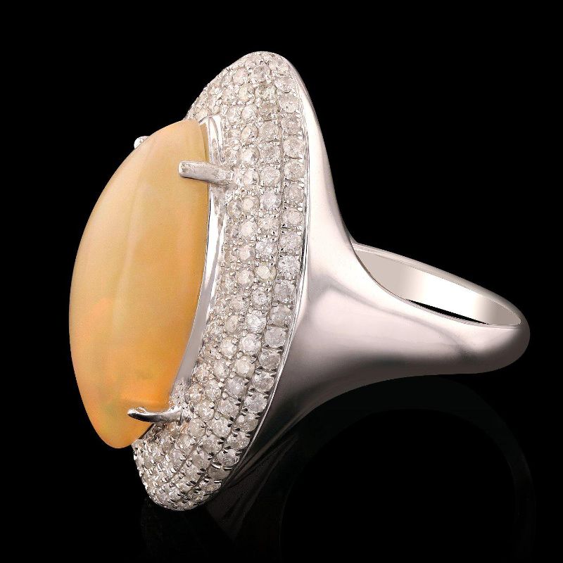 Photo 1 of ORIANNE 4.81ct OPAL AND 1.59ctw DIAMOND14K WHITE GOLD RING, TOTAL WEIGHT OF RING 7.97 g SIZE 7 WITH APPRAISAL RN019055