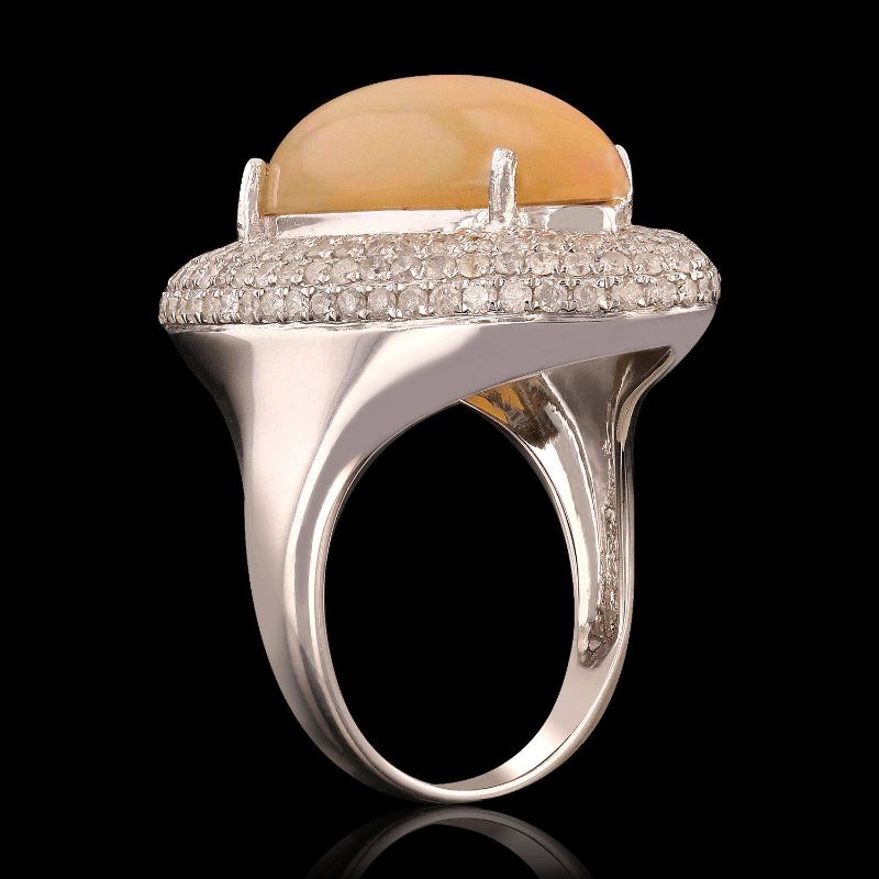 Photo 1 of ORIANNE 4.81ct OPAL AND 1.59ctw DIAMOND14K WHITE GOLD RING, TOTAL WEIGHT OF RING 7.97 g SIZE 7 WITH APPRAISAL RN019055