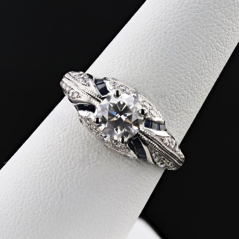 Photo 1 of ORIANNE 1.04ct CENTER DIAMOND AND 0.95ctw BLUE SAPPHIRE PLATINUM RING (1.48ctw DIAMONDS) TOTAL WEIGHT 6.3 g SIZE 6 3/4 WITH APPRAISAL RN027091