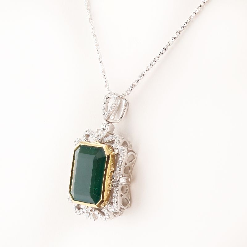 Photo 1 of ORIANNE 12.36ct EMERALD AND 0.83ctw DIAMOND 18K YELLOW AND WHITE GOLD PENDANT WITH CHAIN, TOTAL WEIGHT 15.9 g LENGTH 18" WITH APPRAISAL NK014383