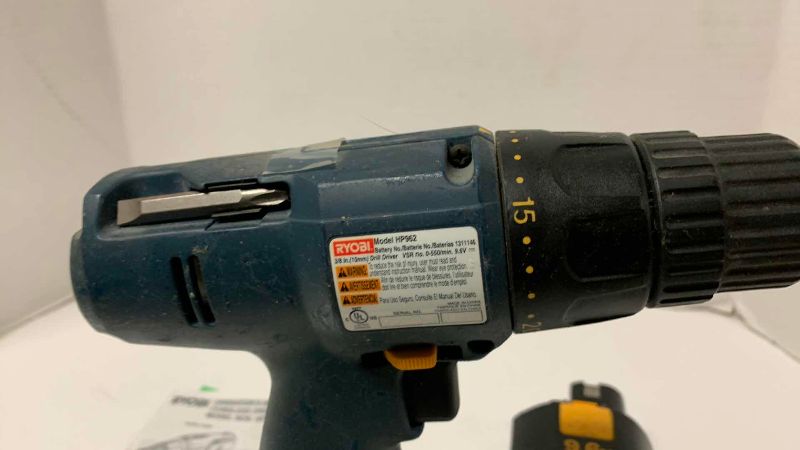 Photo 1 of RYOBI 9.6 V DRILL MOTOR AND 2 BATTERIES HP962