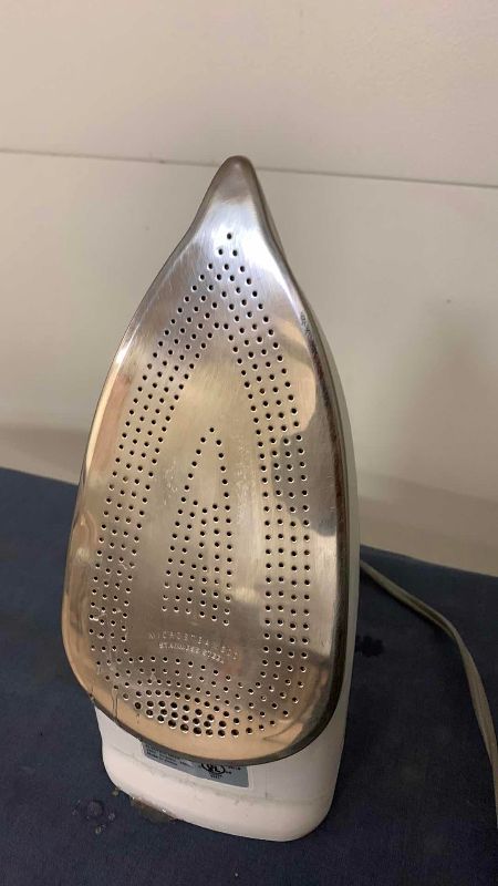 Photo 1 of ROWENTA IRON AND IRONING BOARD