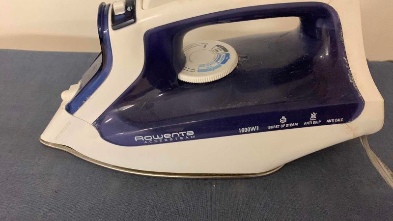 Photo 1 of ROWENTA IRON AND IRONING BOARD