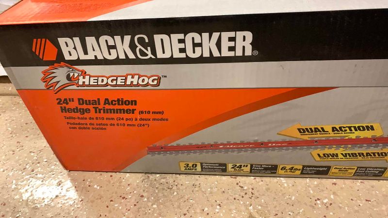Photo 1 of BLACK AND DECKER 24” ELECTRIC HEDGE TRIMMER