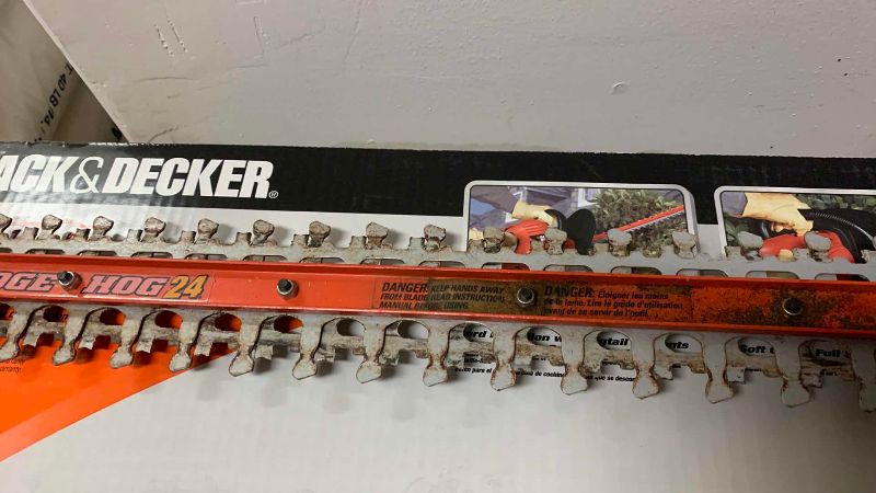 Photo 1 of BLACK AND DECKER 24” ELECTRIC HEDGE TRIMMER