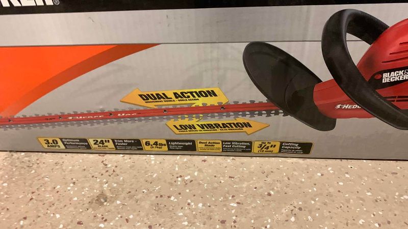 Photo 1 of BLACK AND DECKER 24” ELECTRIC HEDGE TRIMMER