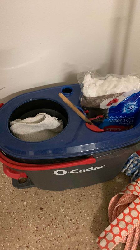 Photo 1 of MOP, BUCKET AND CLEANING SUPPLIES