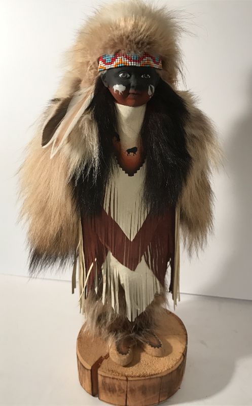 Photo 1 of NATIVE AMERICAN INDIAN FIGURE AUTHENTICALLY DRESSED IN  REAL FUR & SUEDE 
H/19”