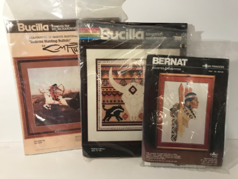 Photo 1 of VINTAGE CROSS STITCH KITS NOS 
1985 BERNAT INDIAN PRINCESS KIT 
BUCILLA HUNTING BUFFALO NEEDLEPOINT  KIT
BUCILLA BUFFALO SKULL LONG-STITCH KIT 
