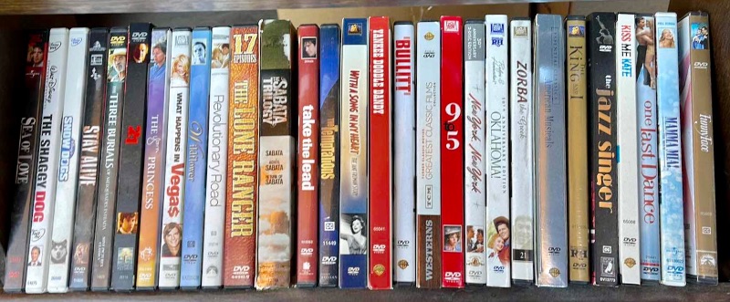 Photo 3 of DVDS W/ STAND MOSTLY WATCHED ONCE OR NEW 