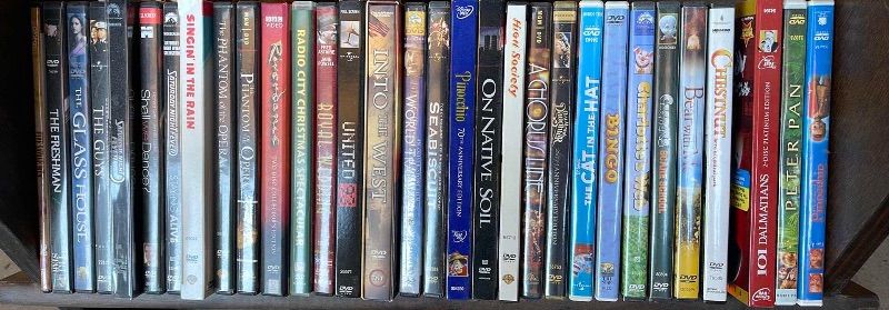 Photo 4 of DVDS W/ STAND MOSTLY WATCHED ONCE OR NEW 