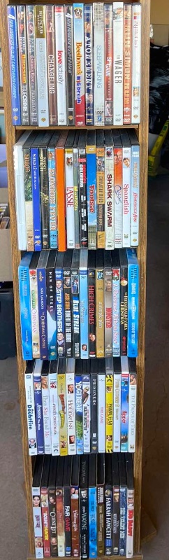 Photo 1 of DVDS W/ TOWER ROTATING STAND MOSTLY WATCHED ONCE OR NEW