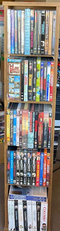 Photo 1 of DVDS W/ TOWER ROTATING STAND MOSTLY WATCHED ONCE OR NEW