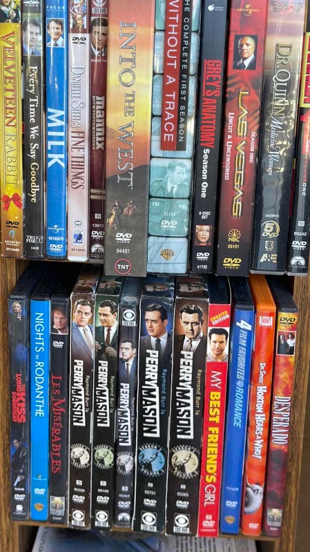 Photo 1 of DVDS W/ TOWER ROTATING STAND MOSTLY WATCHED ONCE OR NEW