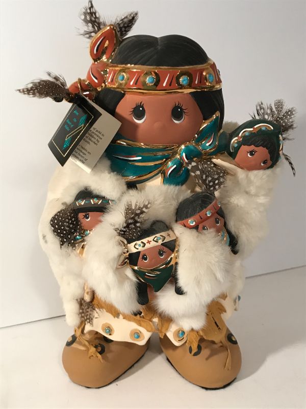 Photo 1 of “FROM THE HEART OF IDAHO”
NATIVE AMERICAN STYLE FIGURE WITH BABIES -
FUR TRIMMED 
13.5”