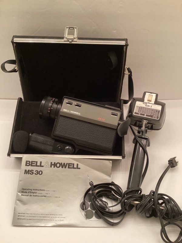 Photo 1 of BELL & HOWELL MS 30 SOUND MOVIE CAMERA & SYLVANIA SUN GUN MOVIE LIGHT