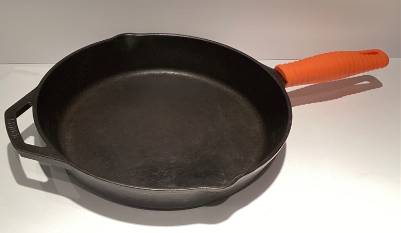 Photo 1 of LODGE MADE IN USA 12” CAST IRON SKILLET WITH SILICONE HANDLE