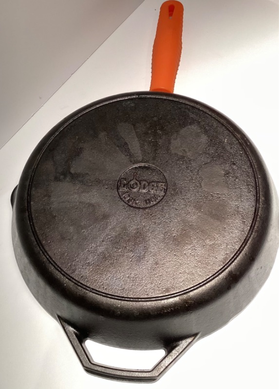 Photo 2 of LODGE MADE IN USA 12” CAST IRON SKILLET WITH SILICONE HANDLE