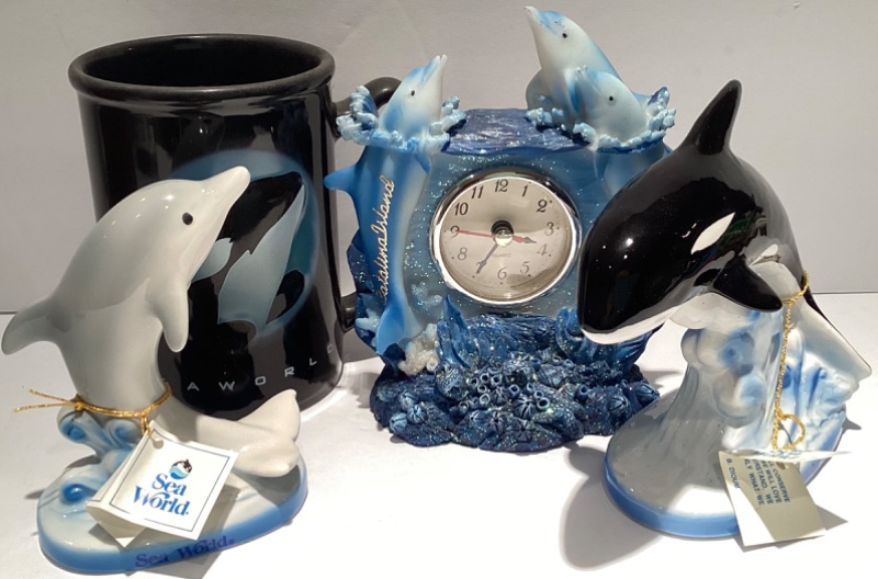 Photo 1 of SEA WORLD DOLPHIN MUG & STATUES, CATALINA ISLAND DOLPHIN CLOCK