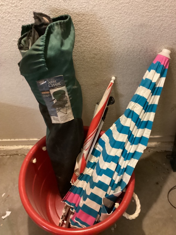 Photo 1 of FOLDING CHAIR/ LARGE RED PAIL & SUN UMBRELLAS