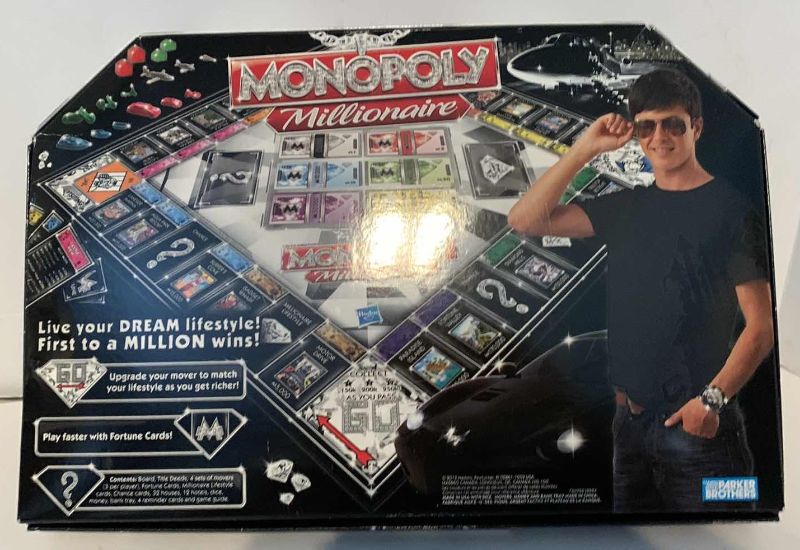 Photo 2 of MONOPOLY MILLIONAIRE EDITION GAME