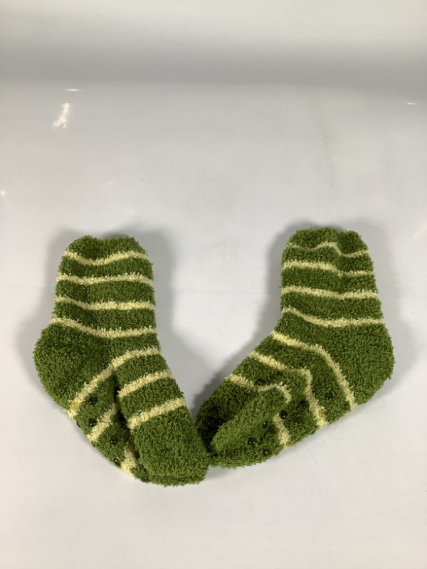 Photo 1 of CHILDRENS GREEN FUZZY NON SKID SOCK PAIR 