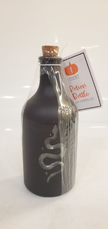 Photo 1 of BLACK POTION BOTTLE NEW