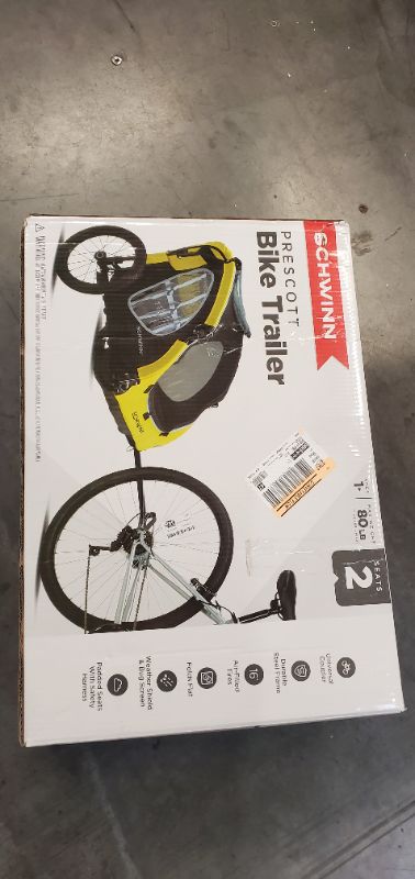 Photo 2 of Schwinn Prescott foldable bike trailer, 2 passengers, yellow