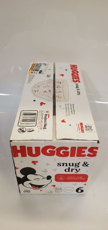 Photo 4 of Huggies Snug & Dry Baby Diapers, Size 6 (35+ lbs), 104 Ct Size 6 (104 Count)