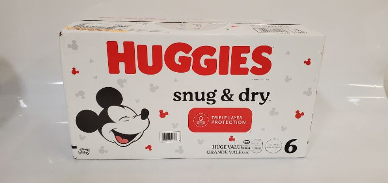 Photo 3 of Huggies Snug & Dry Baby Diapers, Size 6 (35+ lbs), 104 Ct Size 6 (104 Count)