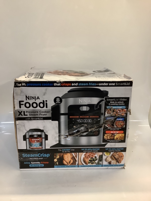 Photo 2 of Ninja OL601 Foodi XL 8 Qt. Pressure Cooker Steam Fryer with SmartLid, 14-in-1 that Air Fries, Bakes & More, with 3-Layer Capacity, 5 Qt. Crisp Basket & 45 Recipes, Silver/Black 8-Quart 3-Layer Meals Silver/Black