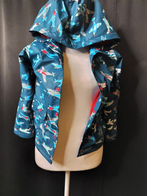 Photo 1 of BOYS HATLEY AIRPLANE THEMED RAIN JACKET SIZE 7