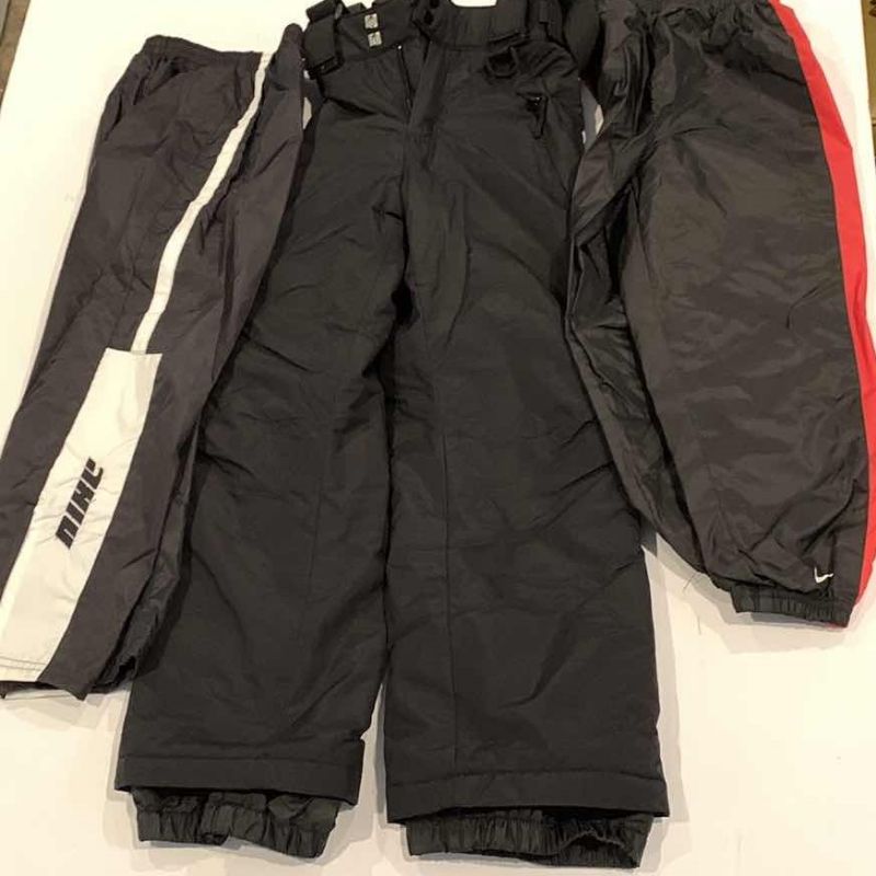 Photo 1 of KIDS SKI PANT 10 AND A PAIR OF NIKE WIND OANTS SIZE 6 AND 7