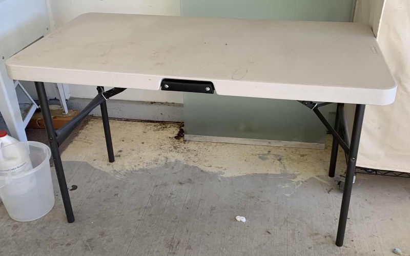 Photo 1 of FOLDING TABLE 48” LONG