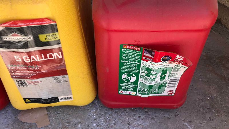 Photo 1 of 4 FIVE GALLON GAS AND DIESEL CONTAINERS