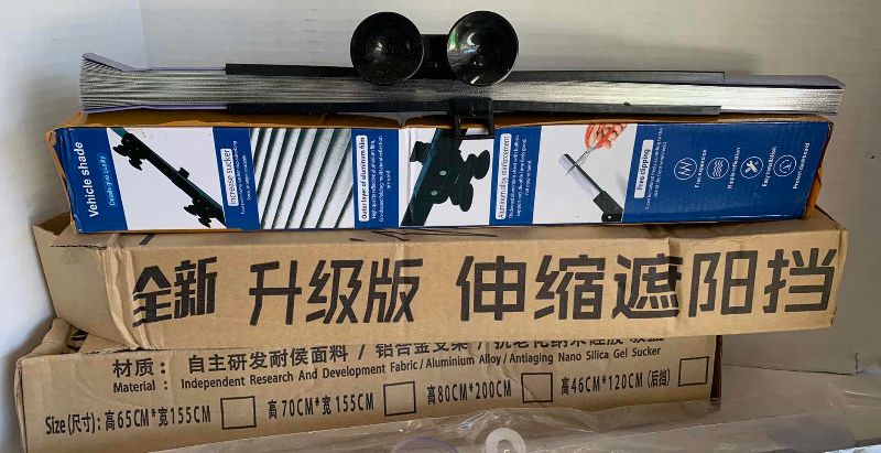 Photo 1 of ASSORTED SUNSHADES 27” & 18” IN LENGTH