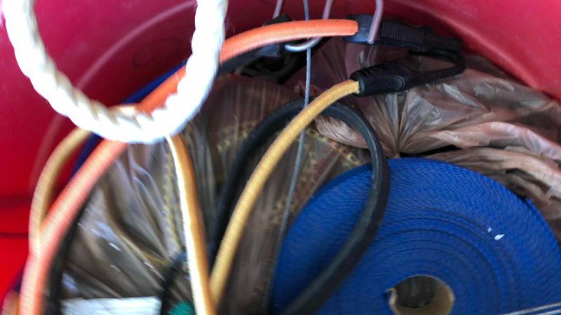 Photo 1 of CONTAINER OF BUNGEE CORDS AND STRAPS