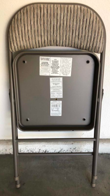 Photo 1 of METAL AND CLOTH FOLDING CHAIR