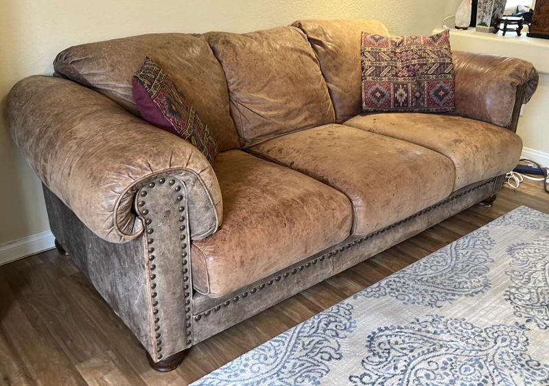 Photo 2 of 6’ TAN DISTRESSED LEATHER SOFA W NAILHEADS STUDDED TRIM (SEE PICTURES FOR WEAR)