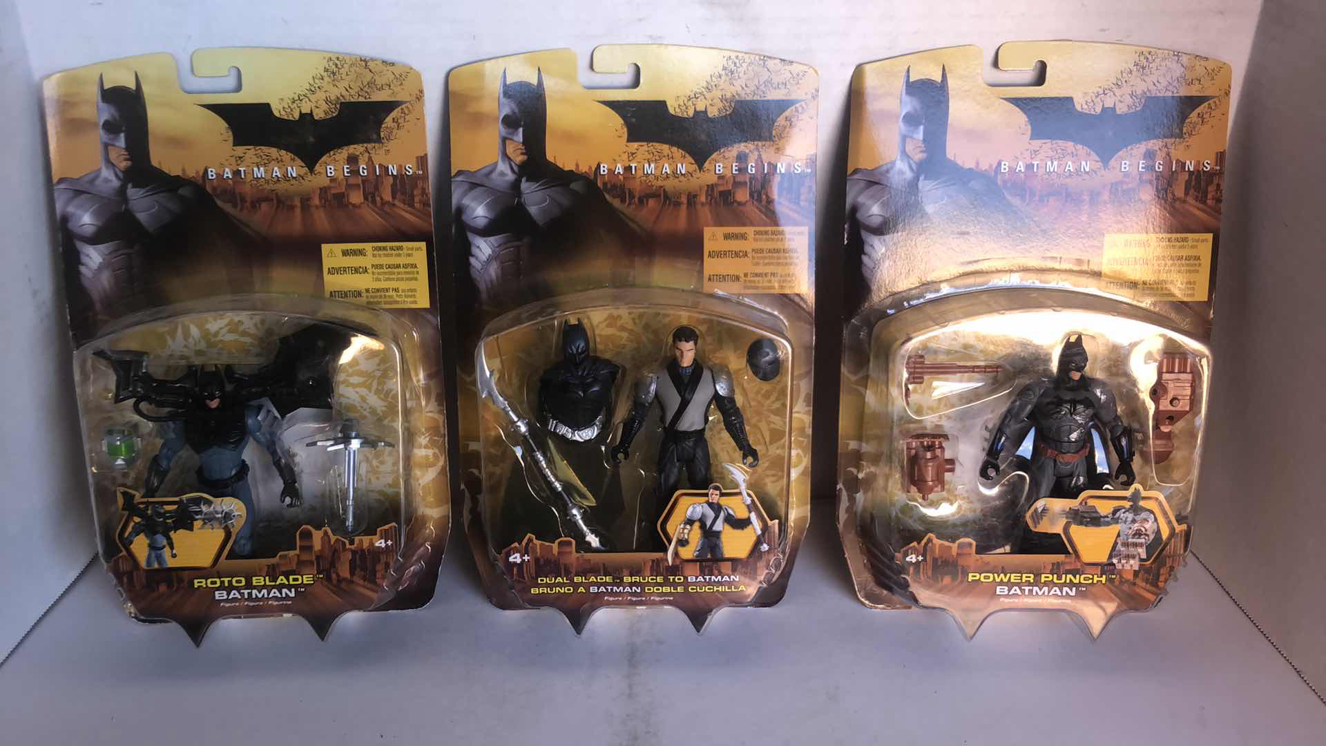 Photo 1 of NIB BATMAN BEGINS ROTO BLADE BATMAN, DUAL BLADE BRUCE TO BATMAN AND POWER PUNCH BATMAN