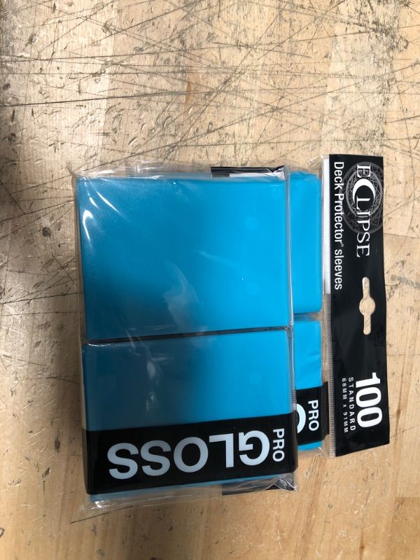 Photo 2 of ** SETS OF 2**
Ultra Pro E-15603 Eclipse Gloss Standard Sleeves (100 Pack) -Sky Blue
