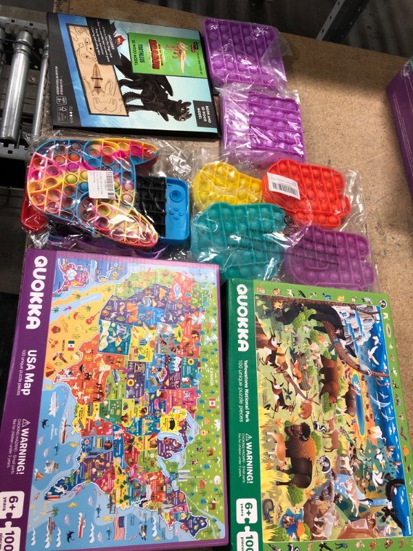 Photo 1 of **NON REFUNDABLE MISCLLANEOUS ITEMS**
puzzles, sensory toys