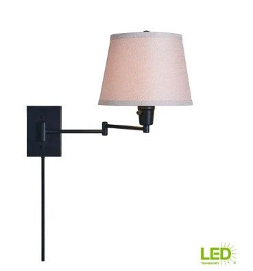 Photo 1 of 1-Light Oil Rubbed Bronze Swing Arm Lamp with Fabric Shade with LED Bulb
by Hampton Bay **Working and has all parts** 