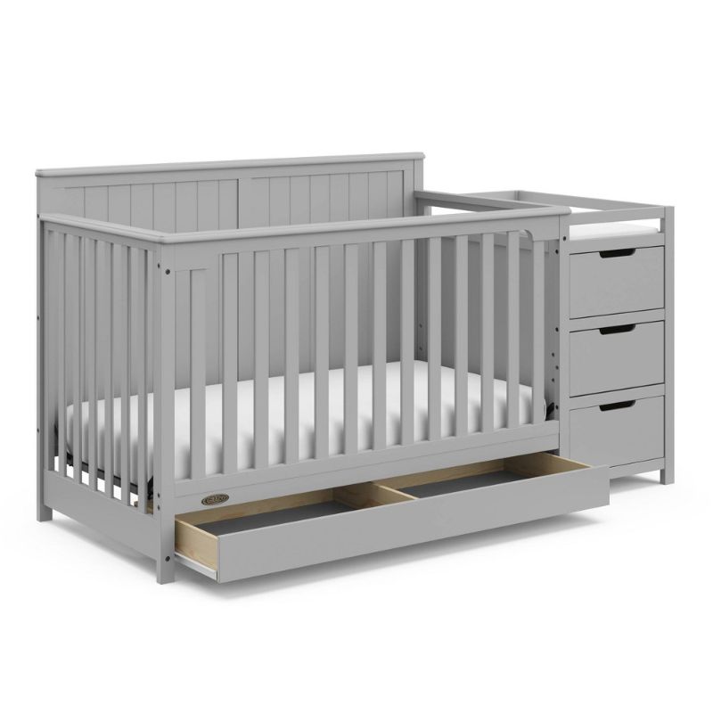 Photo 1 of Graco Hadley 4-in-1 Convertible Crib and Changer with Drawer Pebble Gray
