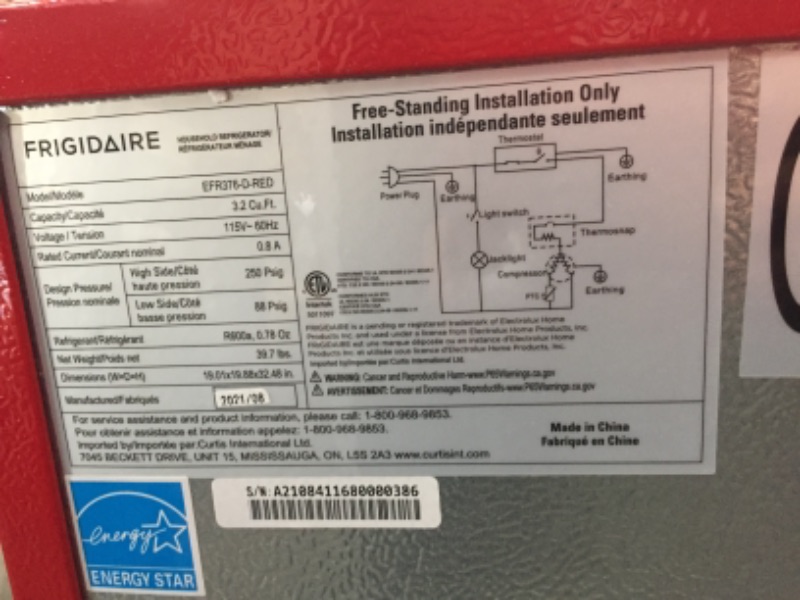 Photo 5 of (BROKEN DOOR JOINT; MULTIPLE DENTS; DAMAGED DOOR)
Frigidaire 3.2 Cu. Ft. Retro Compact Refrigerator with Side Bottle Opener EFR376, Red