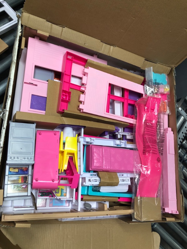 Photo 3 of *NEW PREVIOUSLY OPENED* Barbie Dreamhouse Doll House Playset Barbie House with 75+ Accesssories Wheelchair Accessible Elevator Pool, Slide and Furniture