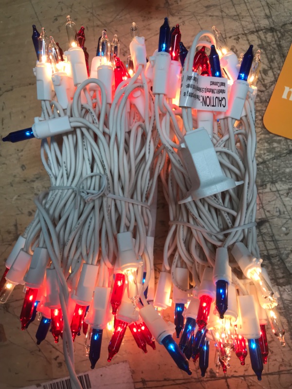 Photo 2 of *** POWERS ON *** 4th of July Decor Patriotic String Lights - 150 Count 27 Drops Red White Blue Incandescent Bulb Waterproof Connectable String Lights Plug in for Indoor Outdoor Party Patio Independence Day Decor Red White Blue 150 Bulbs 10 FT