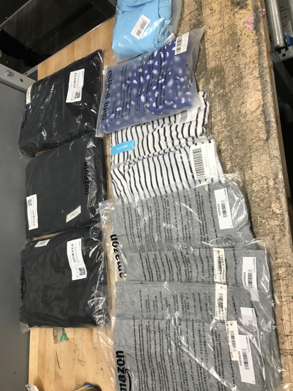 Photo 1 of 11 ASSORTED MEN AND WOMEN CLOTHING