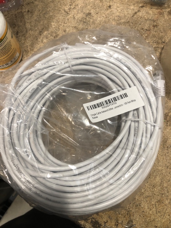 Photo 2 of Cmple Cat5e Network Ethernet Cable - Computer LAN Cable 1Gbps - 350 MHz, Gold Plated RJ45 Connectors - 100 Feet White 100FT White